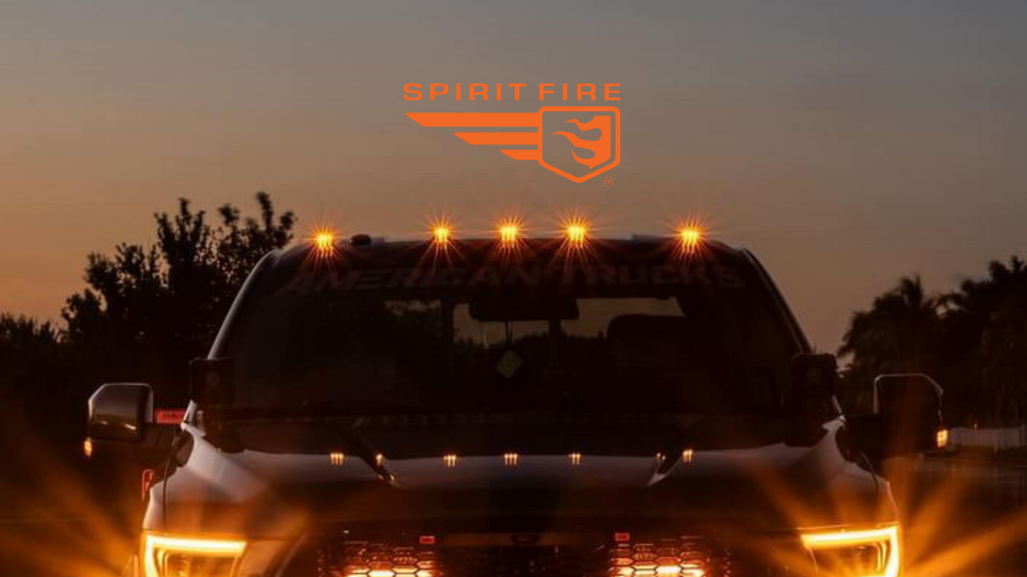 Truck with truck cab lights glowing at night, featuring wireless, vibration-activated, solar-powered cab lights for an enhanced look